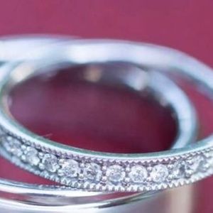 Diamond and white gold wedding band, 16 diamonds, re-dipped, Morgan Jeweler’s